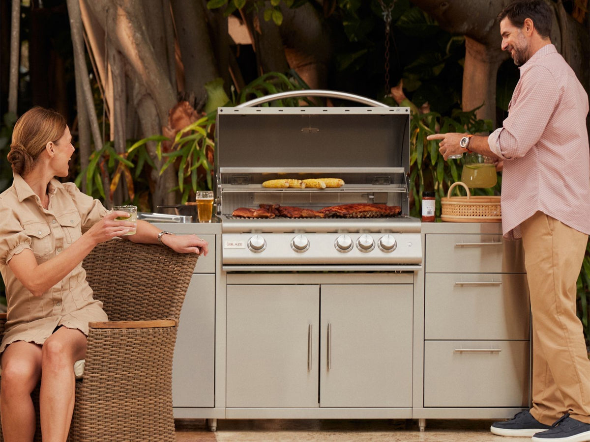 Blaze LTE+ 8-Piece 32" Outdoor Kitchen Package with PCM Components – grill in outdoor kitchen (lifestyle)